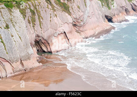 Flysch formation next to the beach in Zumaia Geopark. Basque Country. Spain. Stock Photo