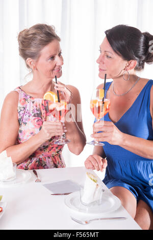 two attractive women having a light dinner Stock Photo