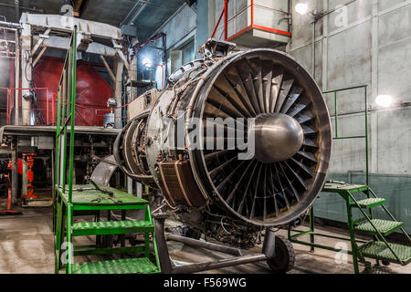 Airplane gas turbine engine detail in hangar Stock Photo