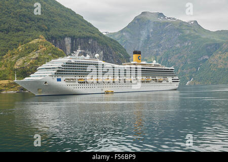 The Giant Cruise Ship, Costa Fortuna, Moored In Geiranger Fjord, Norway. Stock Photo