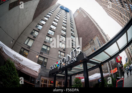 A Four Points by Sheraton Hotel, a brand of Starwood Hotels, in the Chelsea neighborhood of New York on Tuesday, October 27, 2015. Three Chinese companies,  Shanghai Jin Jiang International Hotels, HNA Group and the China Investment Corp. are seeking approval from Beijing to acquire Starwood Hotels.  (© Richard B. Levine) Stock Photo