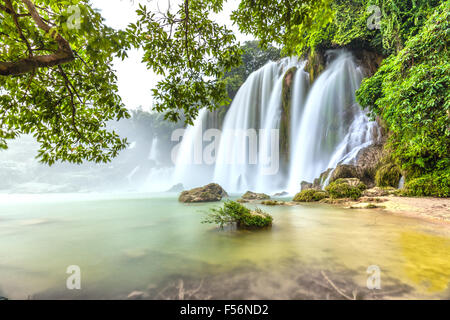 Played with the moss rock waterfall Ban Gioc Stock Photo