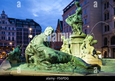 travel to Vienna city - Providentia figure in Donnerbrunnen fountain at Neuer Markt square in Vienna, Austria Stock Photo