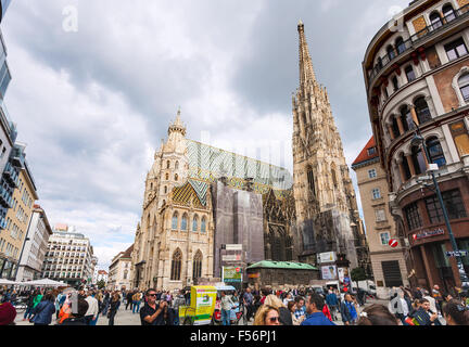 VIENNA, AUSTRIA - SEPTEMBER 27, 2015: St Stephen's Cathedral, tourist on Stephansplatz, Vienna, Austria. The Stephansplatz (Step Stock Photo