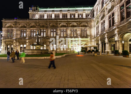 People watching open air live Opera outside the State Opera House in  Karajan Platz Vienna in Austria Stock Photo - Alamy