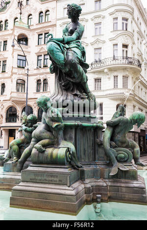 travel to Vienna city - Providentia figure in Providentiabrunnen fountain at Neuer Markt square in Vienna, Austria Stock Photo