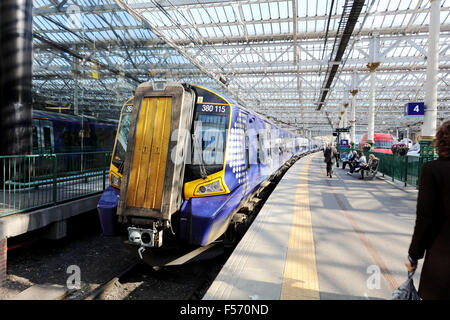 Scotrail Class 380 115 train standing at platform 4.Waverley station. Edinburgh Stock Photo