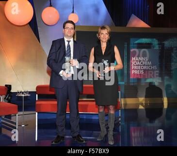 Cologne, Germany. 28th Oct, 2015. The award winners, British journalist Eliot Higgins and ZDF journalist Marietta Slomka, pose during the Hanns Joachim Friedrichs Award ceremony in Cologne, Germany, 28 October 2015. Photo: HORST GALUSCHKA - NO WIRE SERVICE -/dpa/Alamy Live News