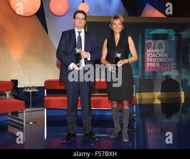 Cologne, Germany. 28th Oct, 2015. The award winners, British journalist Eliot Higgins and ZDF journalist Marietta Slomka, pose during the Hanns Joachim Friedrichs Award ceremony in Cologne, Germany, 28 October 2015. Photo: HORST GALUSCHKA - NO WIRE SERVICE -/dpa/Alamy Live News Stock Photo