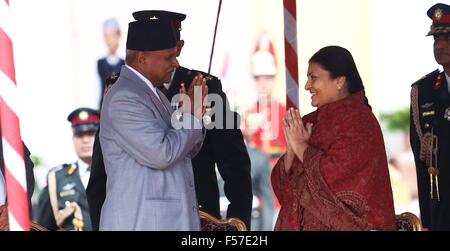 Kathmandu, Nepal. 29th Oct, 2015. Nepal's former President Ram Baran Yadav (L) greets Nepal's newly-elected President Bidhya Devi Bhandari during the oath-taking ceremony in Kathmandu, Nepal, Oct. 29, 2015. Nepal's parliament on Wednesday elected Bidhya Devi Bhandari, vice chairperson of the Communist Party of Nepal (Unified Marxist-Leninist) as the country's first female president. © Sunil Sharma/Xinhua/Alamy Live News Stock Photo