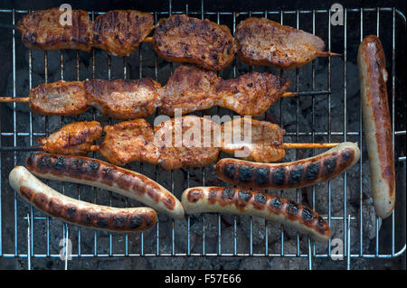 Grilled meat on a charcoal grill Stock Photo