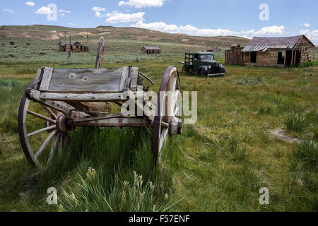 Old wooden cart, vintage car built in the 30s, old wooden houses, ghost town, old gold mining town, Bodie State Historic Park Stock Photo