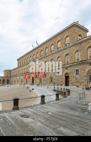 Florence,Italy-August 26,2014:Tourists walking around and waiting outside the Palazzo Pitti (Pitti Palace) during a cloudy day. Stock Photo