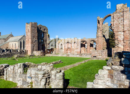 The ruins of the medieval Lindisfarne Priory, Holy Island, Northumberland, England, UK Stock Photo