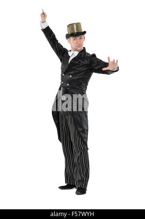 Illusionist Shows Tricks with a Magic Wand, on white background Stock Photo