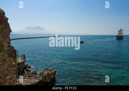 Mediterranean Sea. Traditional entertainment resort of Alanya. Sailing aka pirate ships around the fortress of Alanya. Stock Photo