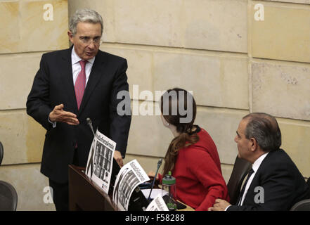 Bogota, Colombia. 29th Oct, 2015. Senator and Former Colombian President Alvaro Uribe (L) attends the Colombia's Senate Plenary Session in Bogota, capital of Colombia, Oct. 29, 2015. The Prenary Session of the Senate cotinued Thursday the discussion of the constitutional reform that was needed to implement the peace agreements with the Armed Revolutionary Forces of Colombia (FARC), according with local press information. Credit:  Juan Paez/COLPRENSA/Xinhua/Alamy Live News Stock Photo