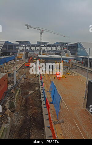 A view taken from the old footbridge looking west over the new platforms being built on the Northern side of the station Stock Photo