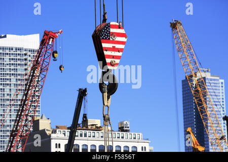 American flag painted on main hook block of a construction crane on construction site, New York City, USA Stock Photo