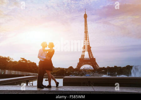 silhouettes of loving couple in Paris Stock Photo