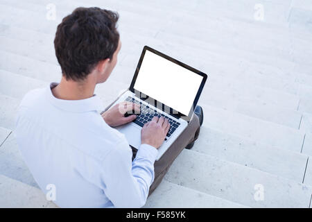 business man using laptop with white screen Stock Photo