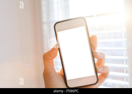 smartphone in the hand Stock Photo