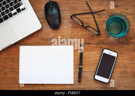 learning online, school supplies on the wooden table Stock Photo
