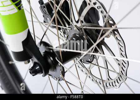 Closeup of MTB (Mountain bike) hydraulic disk brake and wheel hub on a white background Stock Photo