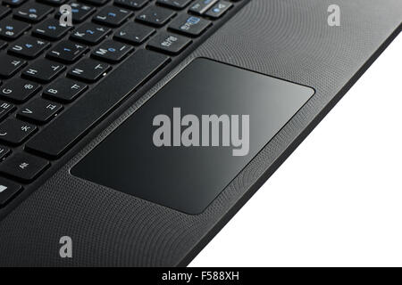 closeup of keypad and touchpad of a laptop computer with index fingers ...