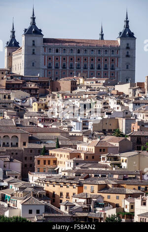 Toledo Spain,Europe,Spanish,Hispanic World Heritage Site,Mirador Del Valle,city skyline,Alcazar,fortress,red clay barrel tiles,buildings,rooftops,Rena Stock Photo