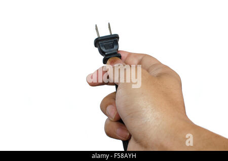 Power plug in a hand on a white background Stock Photo