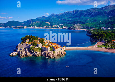 Montenegro, Adriatic coast, Bay of Budva, Island of Sveti Stefan (St. Stephen), once a fishing village, now a luxury hotel compl Stock Photo