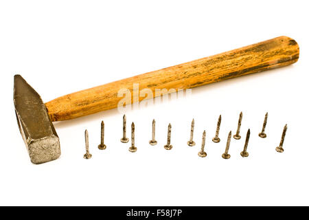 Old hammer and nails isolated on white Stock Photo
