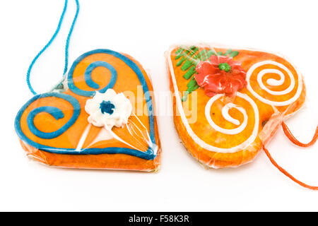 two gingerbread hearts isolated on white background Stock Photo - Alamy
