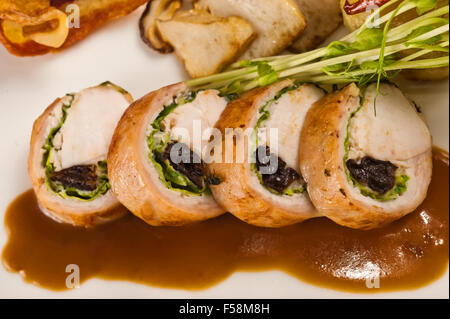 Saddle of rabbit with mushrooms and sauce Stock Photo