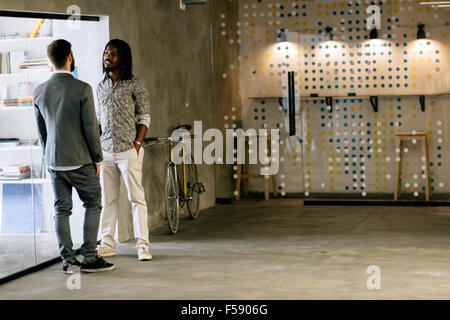 Two colleagues casually talking during break Stock Photo