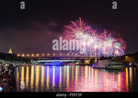 Spectators watching Moscow International Firework Festival 2015 at the Andreevskaya Embankment, Moscow, Russia. Stock Photo