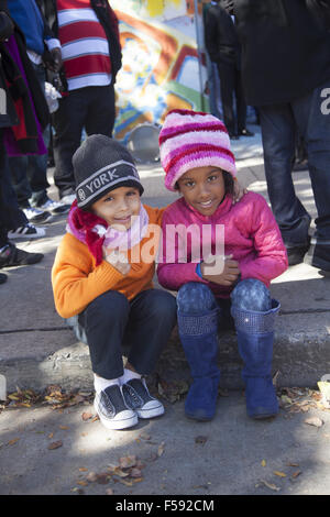 Young spectators at the Panamanian Independence Parade in the Crown Heights neighborhood of Brooklyn NY. Stock Photo