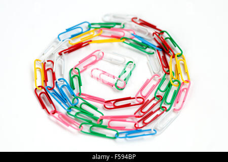 Coloured paper clips on white background Stock Photo