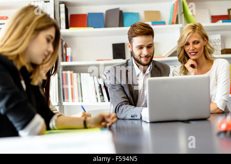 Creative  people brainstorming  in office and discussing new ideas Stock Photo