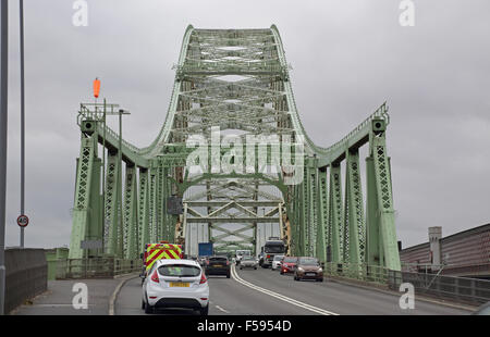 Traffic crossing the Silver Jubilee bridge over the River Mersey in Runcorn, UK. Bridge viewed from the north.