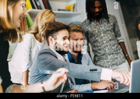 Discussing new ideas in company and sharing them with colleagues Stock Photo