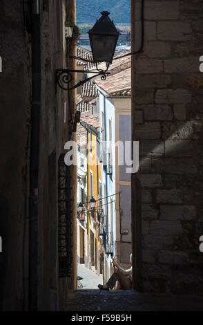Narrow alleyway in the old town of Cuenca, Castilla-la Mancha, Central Spain. Stock Photo