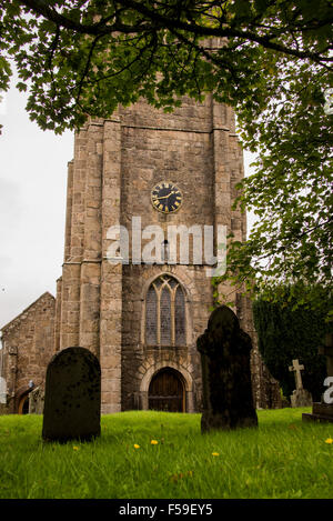 A rainy October day in Chagford near Dartmoor in Devon. The church of St Michael the Archangel and graveyard Stock Photo