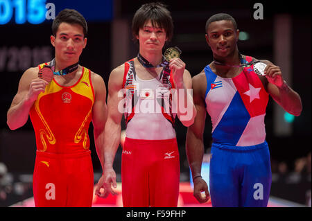 Glasgow, Scotland. 30th Oct, 2015. FIG Artistic Gymnastics World Championships. Day Eight. The three medallists pose after receiving their medals in the All-Around final. Credit:  Action Plus Sports/Alamy Live News Stock Photo
