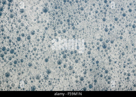 Foam soap suds bubbles water surface Stock Photo