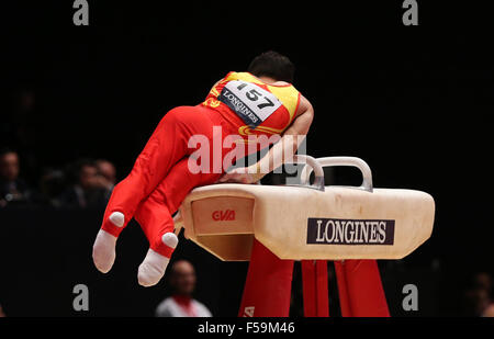 Glasgow, Scotland. 30th Oct, 2015. Xiao Ruoteng of China falls from the pommel horse during the men's All-Around final at the 46th World Artistic Gymnastics Championships in Glasgow, Scotland, Great Britain on Oct. 30, 2015. Credit:  Han Yan/Xinhua/Alamy Live News Stock Photo