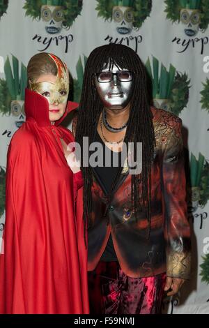 New York, NY, USA. 30th Oct, 2015. Nancy Hunt, Nile Rodgers at arrivals for New York Restoration Project's 20th Anniversary Hulaween Party, The Waldorf-Astoria, New York, NY October 30, 2015. Credit:  Lev Radin/Everett Collection/Alamy Live News Stock Photo