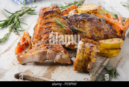 Grilled pork ribs  on wooden cutting board. Selective focus Stock Photo