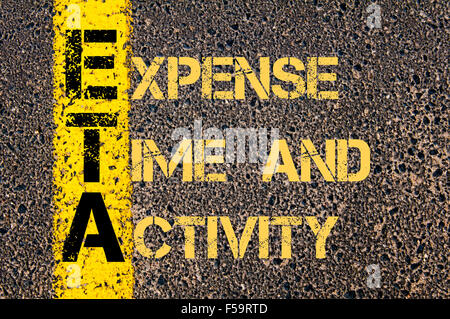 Concept image of Business Acronym ETA as EXPENSE TIME AND ACTIVITY written over road marking yellow paint line. Stock Photo